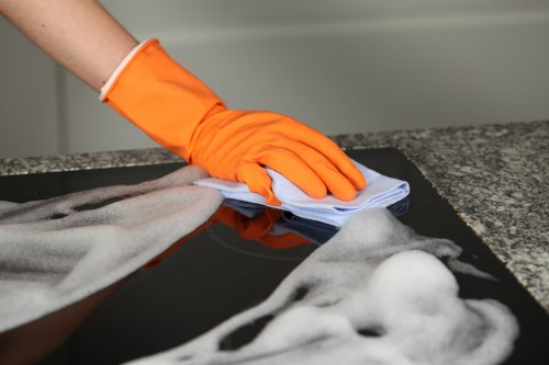 After builders cleaning team removing dust from a renovated Merton home