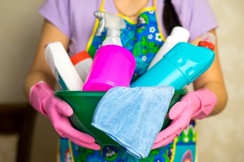 Carpet cleaning staff following safe chemical handling procedures