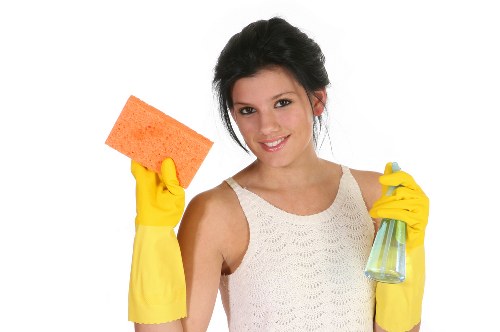 Professional cleaners maintaining a retail unit in Merton